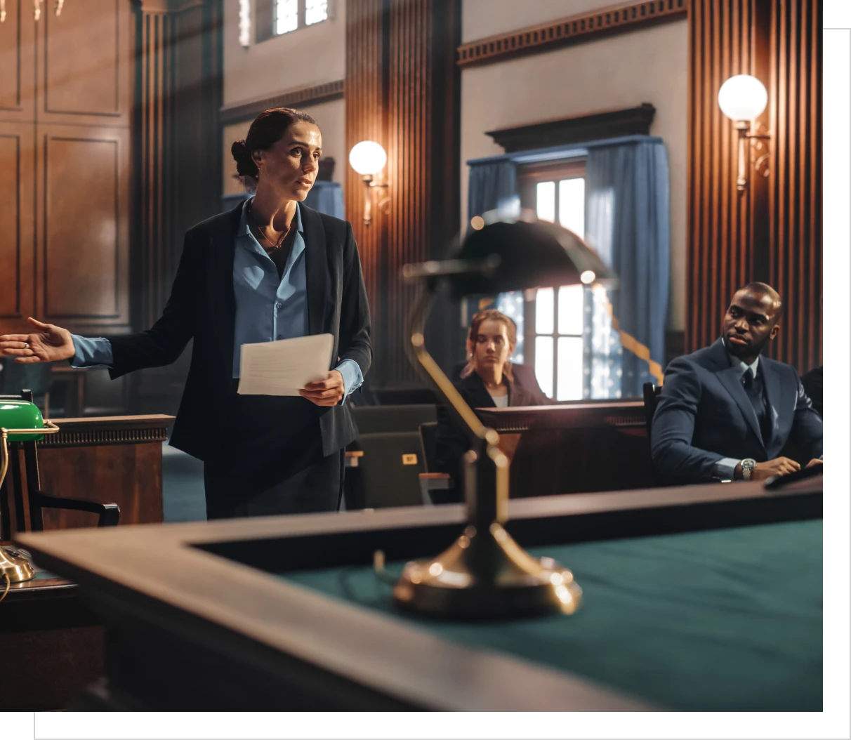 Female lawyer presenting argument in courtroom